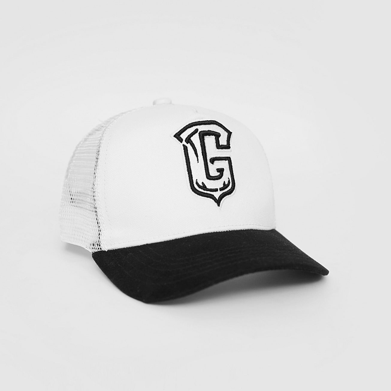 White and black cap with a logo on a light gray background