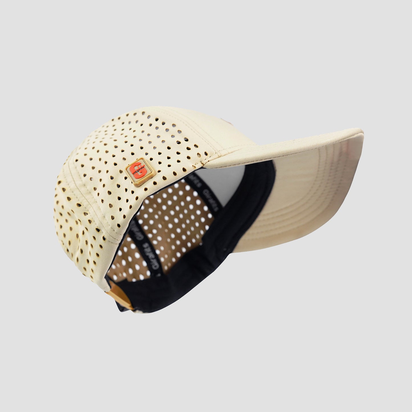 Stretchable Beige cap with laser-cut ventilation