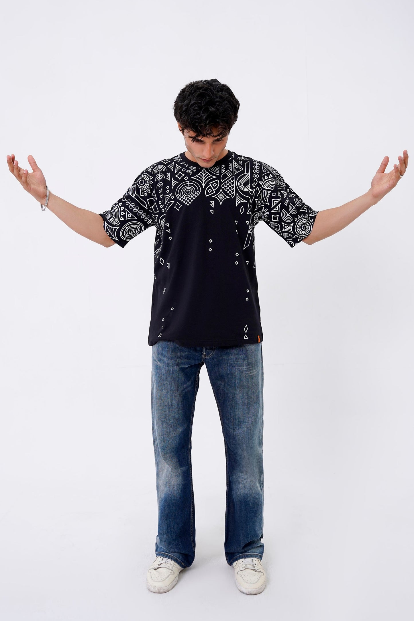 black oversized unisex t-shirt with detailed artistic print