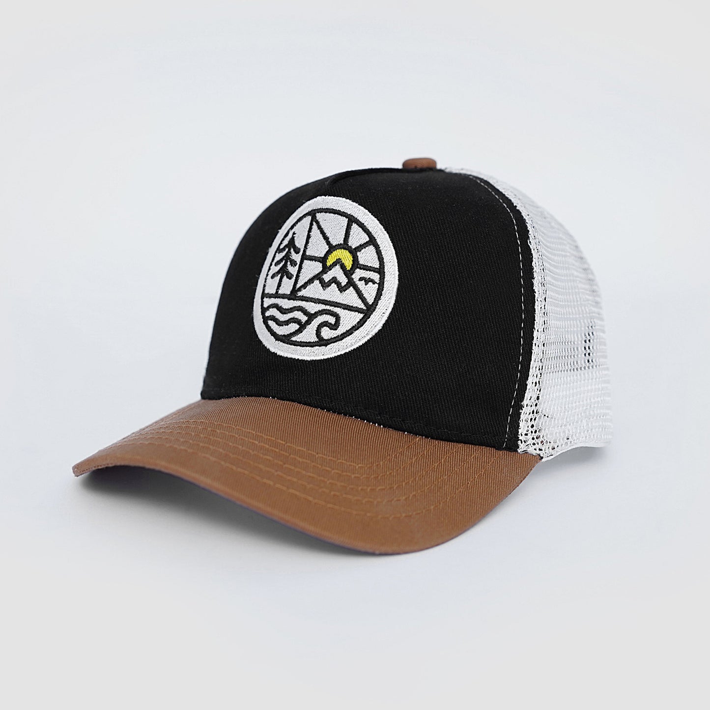 Black and brown trucker cap with a white embroidered design on a light gray background