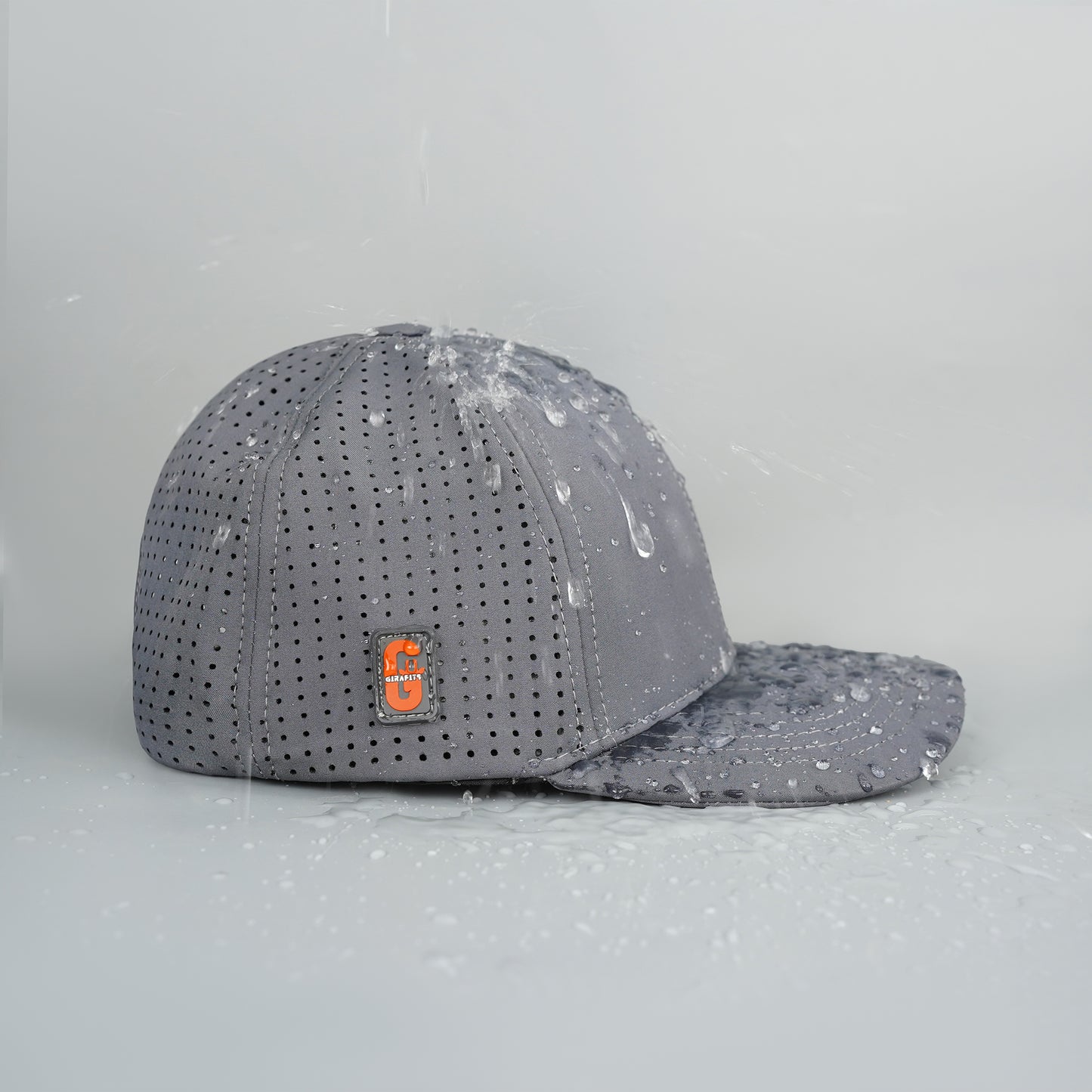 Gray softshell baseball cap with “Drifting Soul” design and laser-cut vents