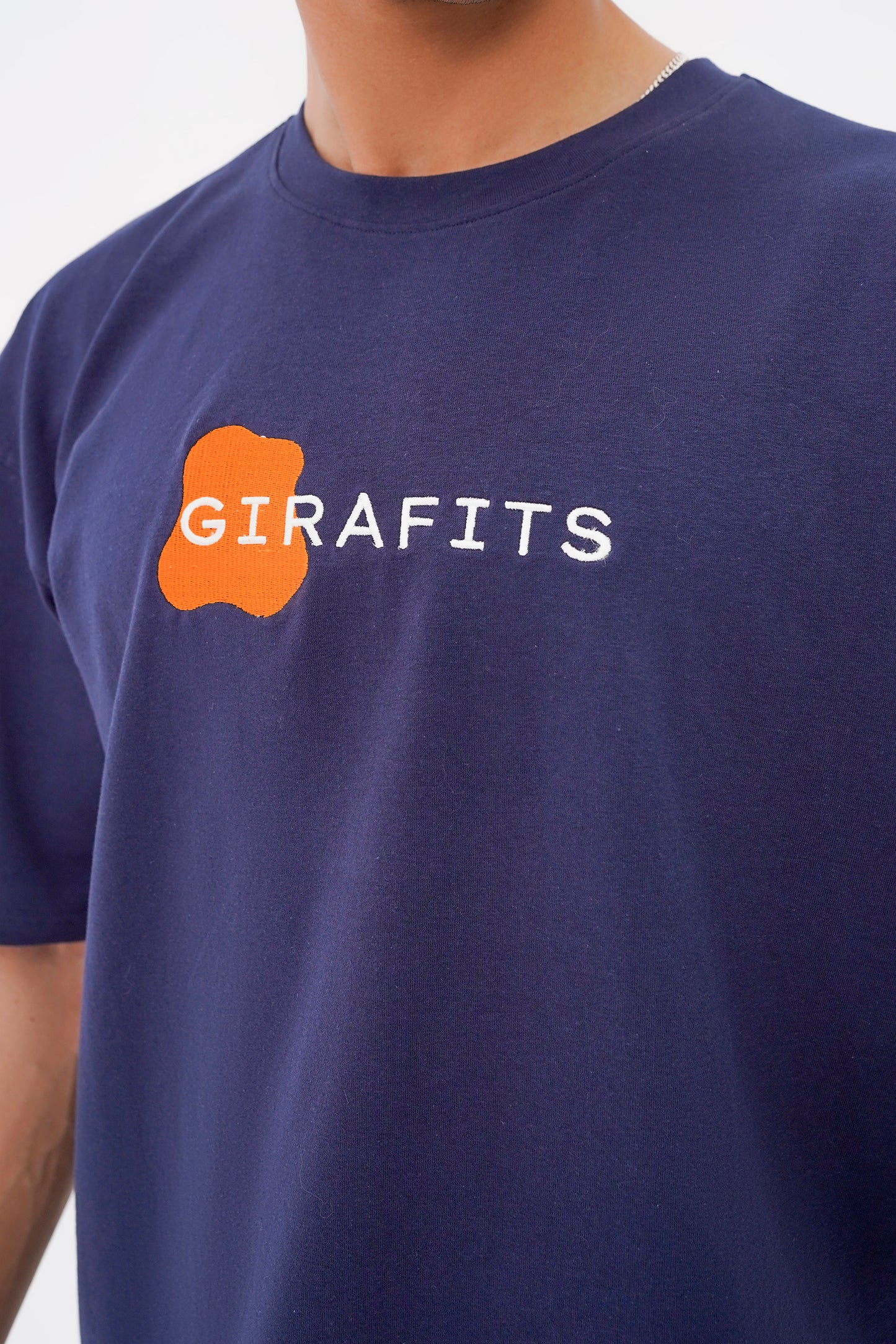 Stretchable navy blue T-shirt with embroidered Girafits text, cotton- spandex fabric