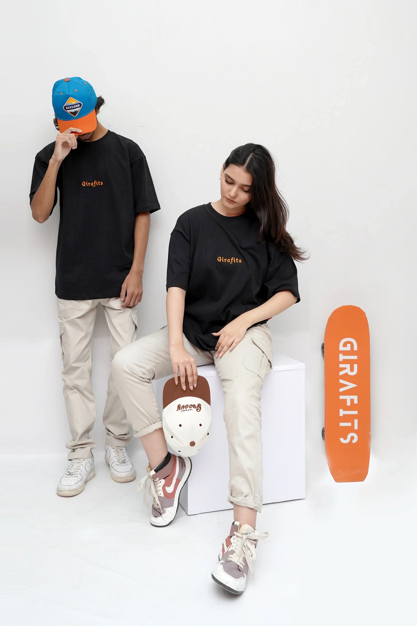 Explorer baseball cap with orange and dark blue design