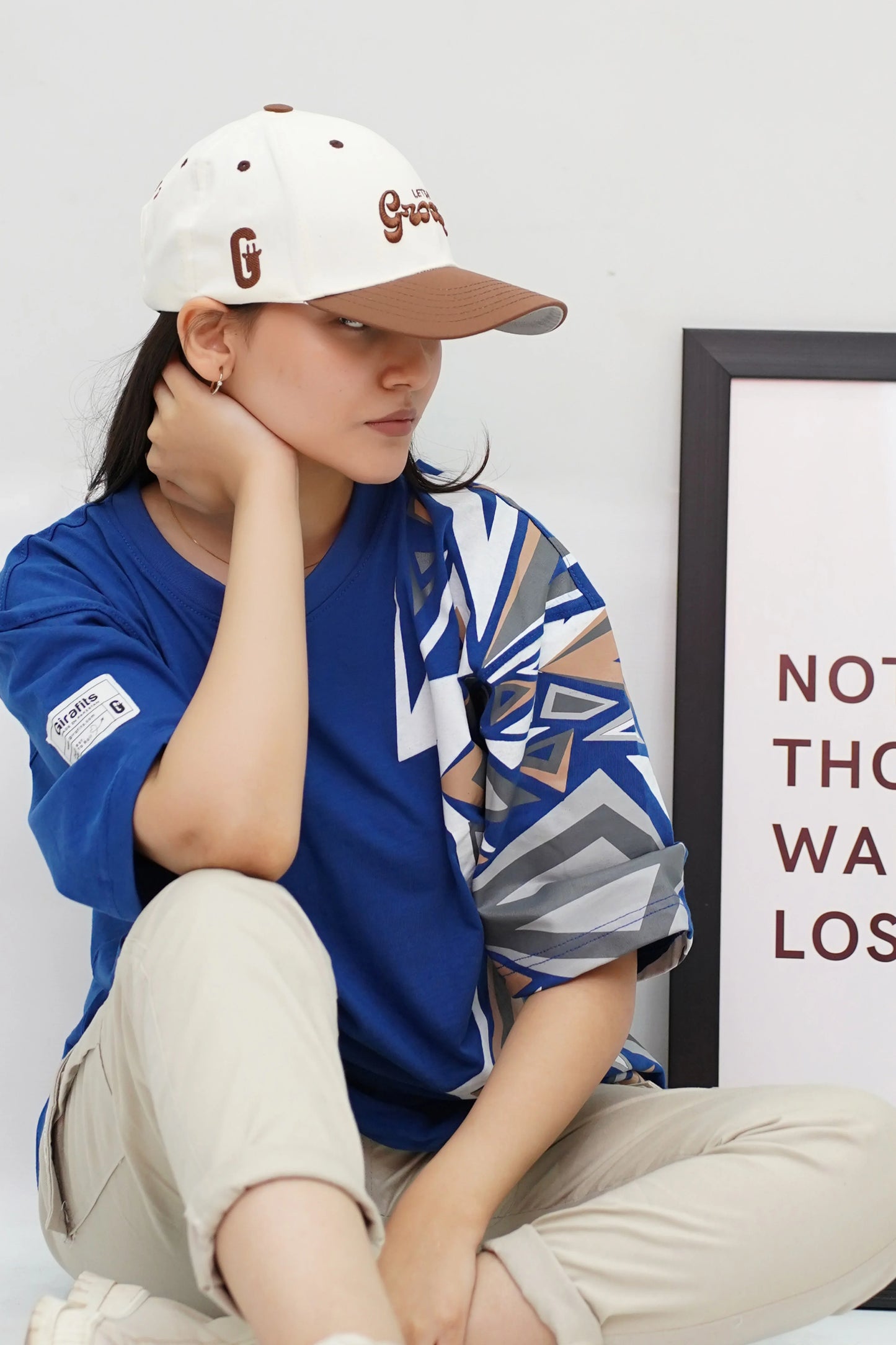 Cream and chocolate brown baseball cap with "Let's Get Groovy" 3D embroidery