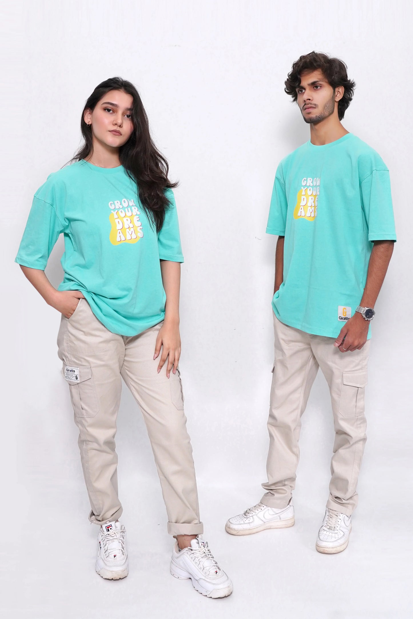 Oversized teal tee with "Grow your dreams" print, cotton jersey