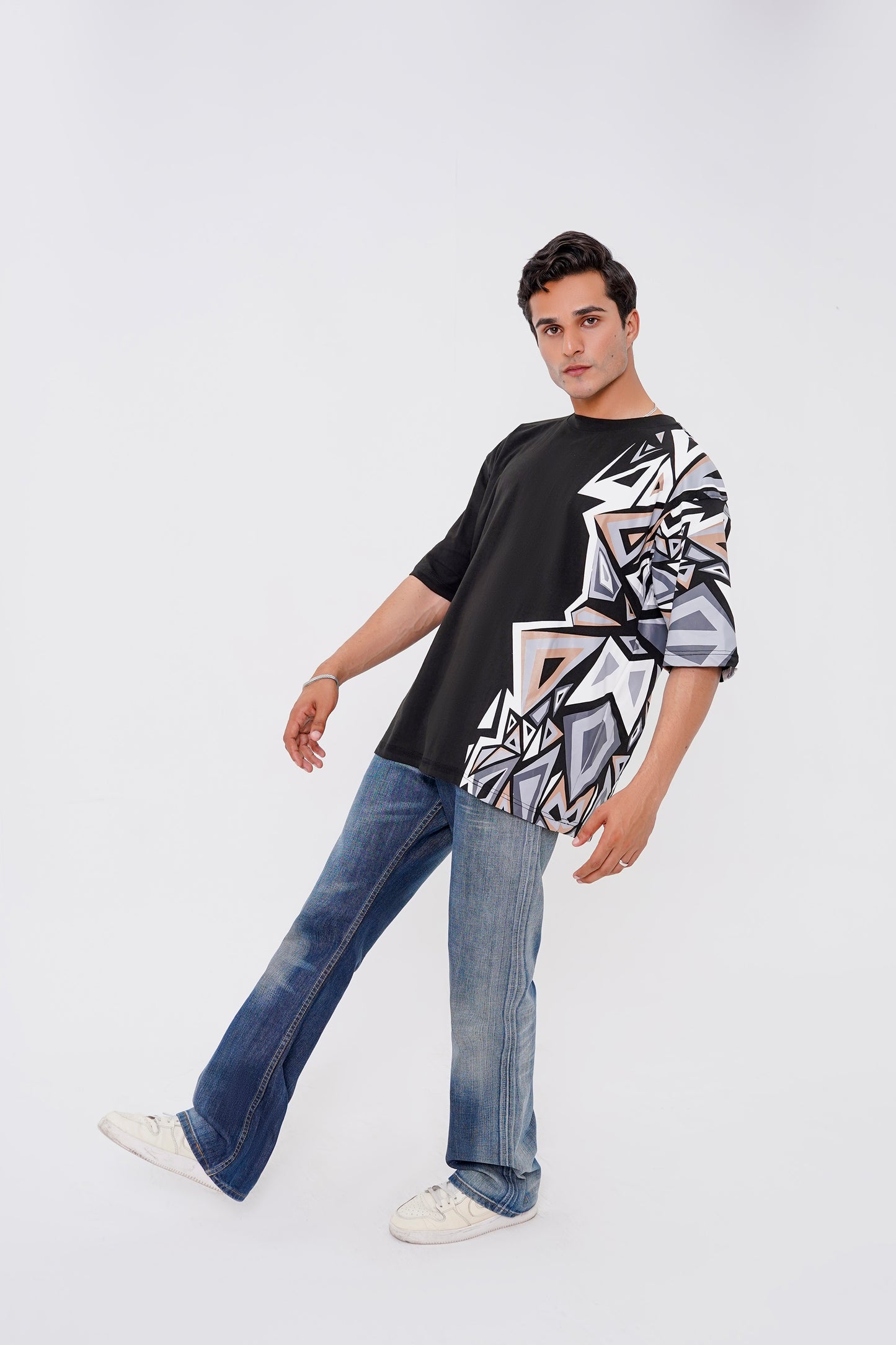 Oversized black t-shirt with abstract shape, unisex streetwear style