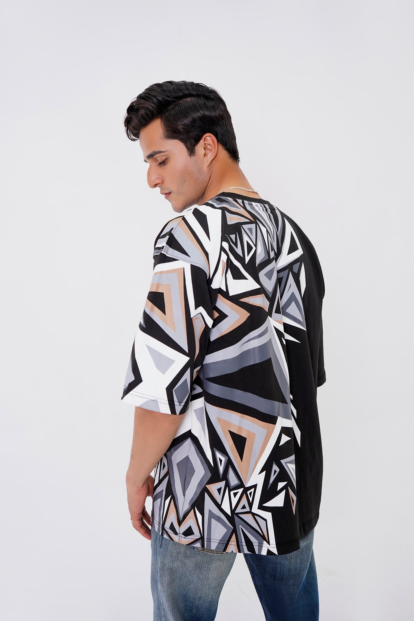 Oversized black t-shirt with abstract shape, unisex streetwear style