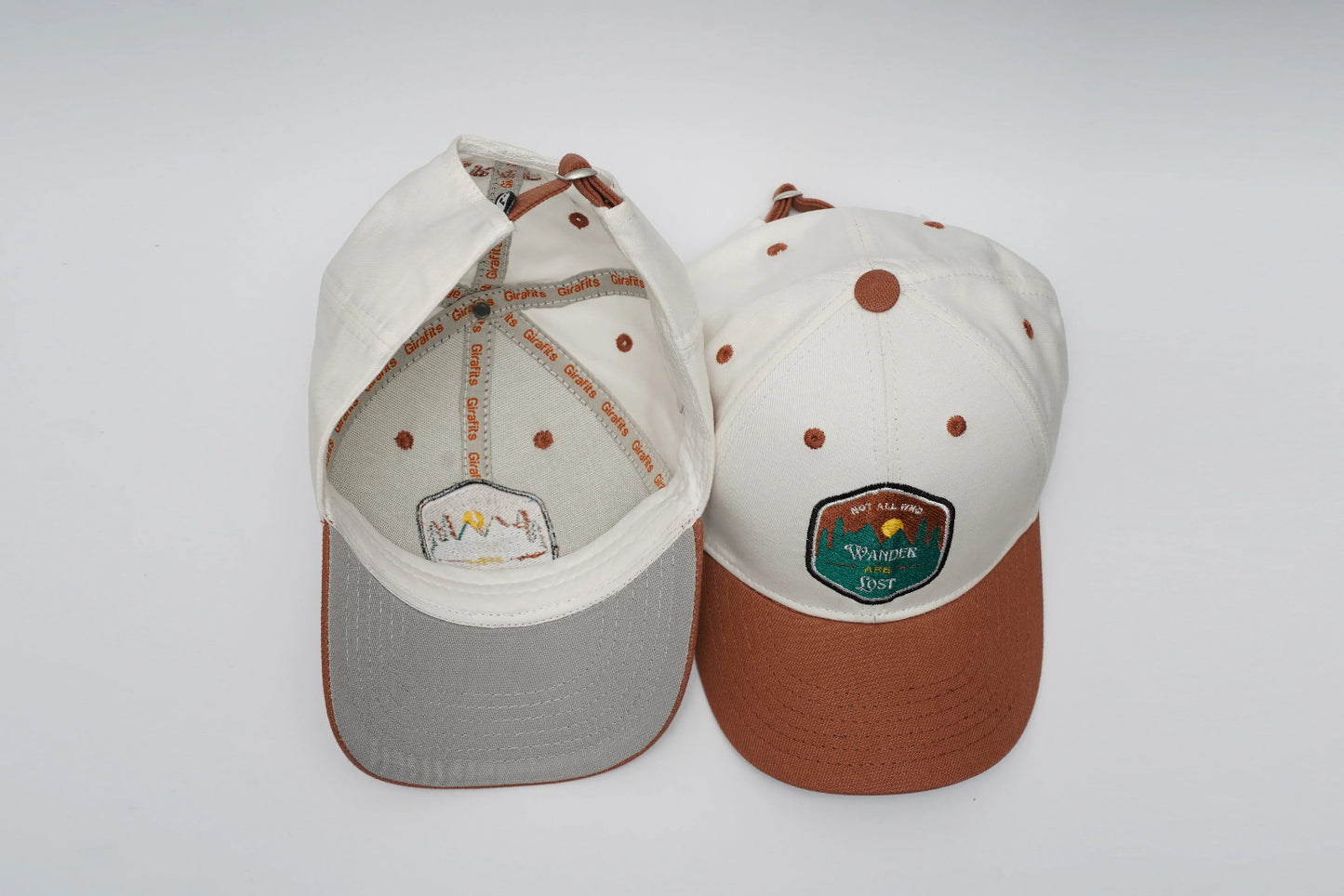 Off-white and brown cap with "Wanderer" 3D embroidery, "Wander are lost" text