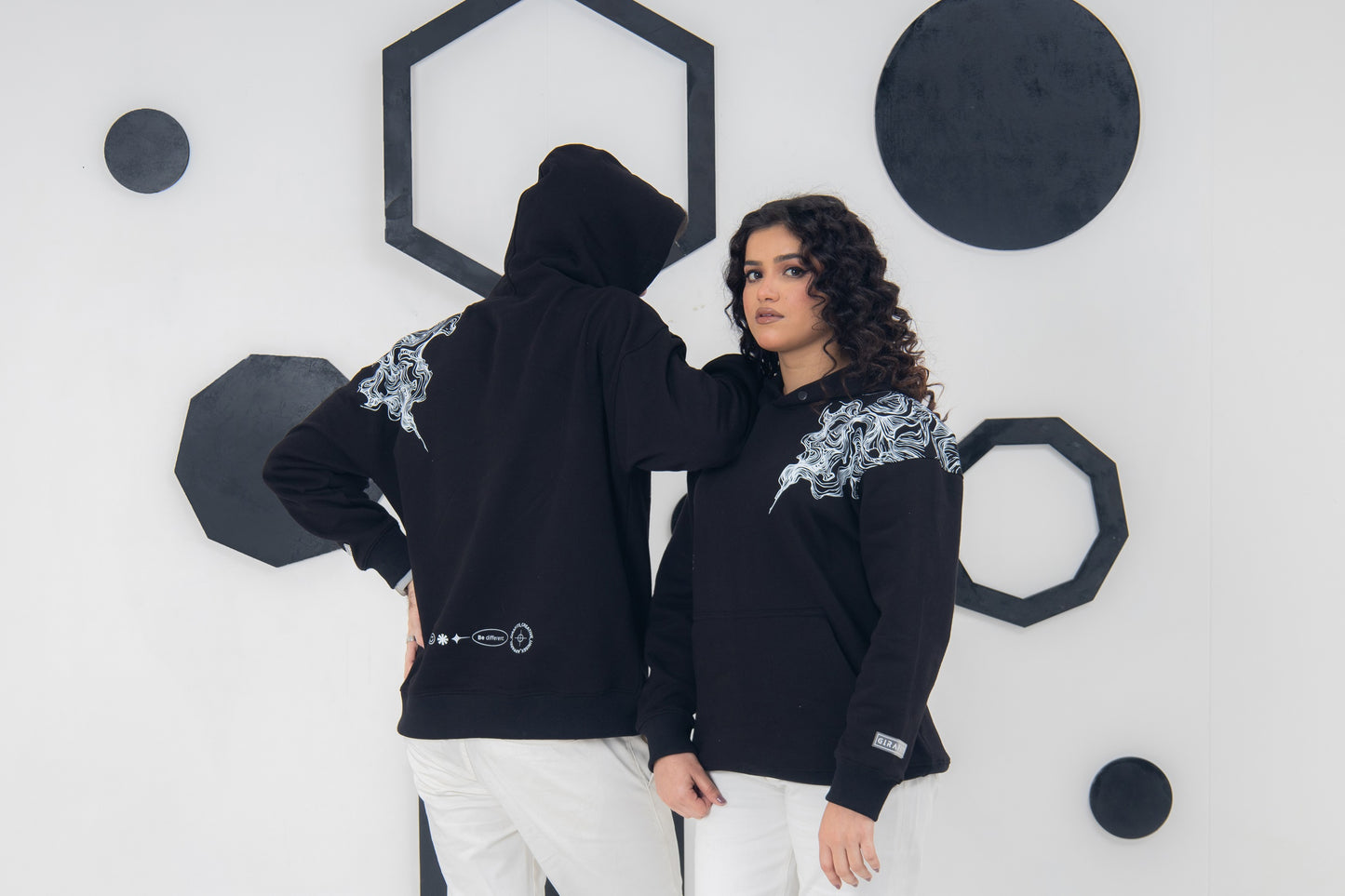 Creative black hoodie with smoky patterns, unisex and cozy fit