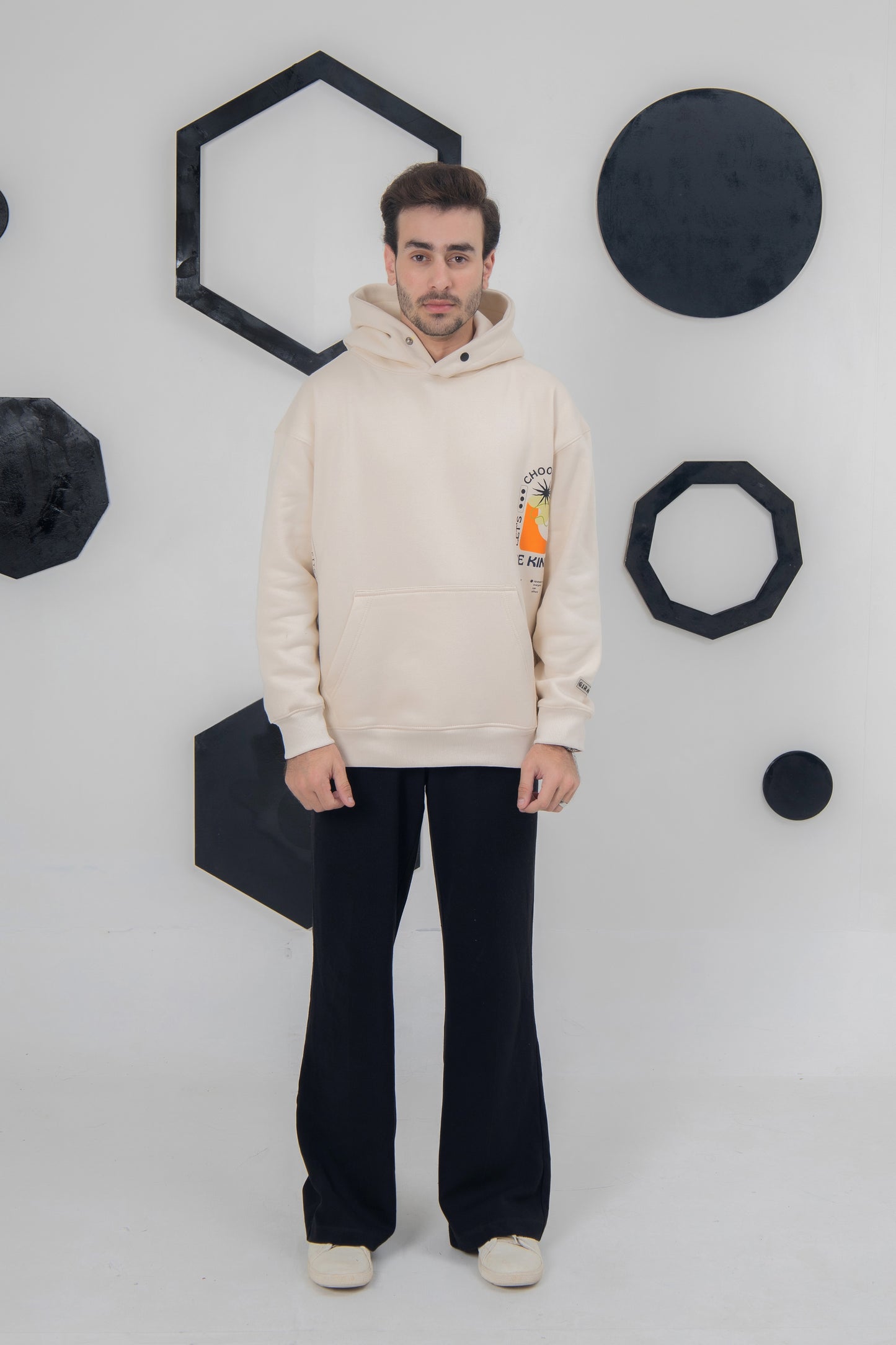 Cream-colored fleece hoodie with kindness slogan, unisex fit