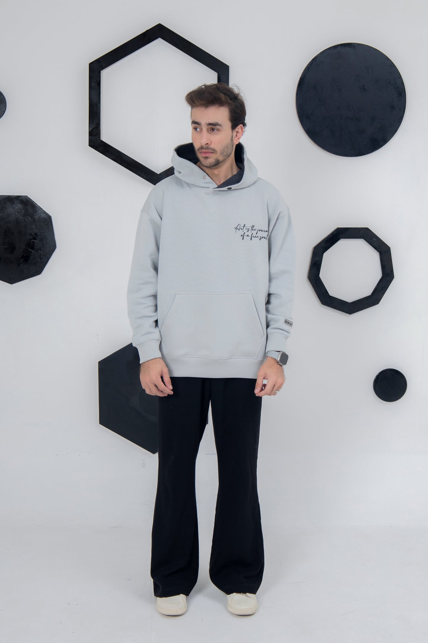 Light gray hoodie with Free Soul message, artistic and warm
