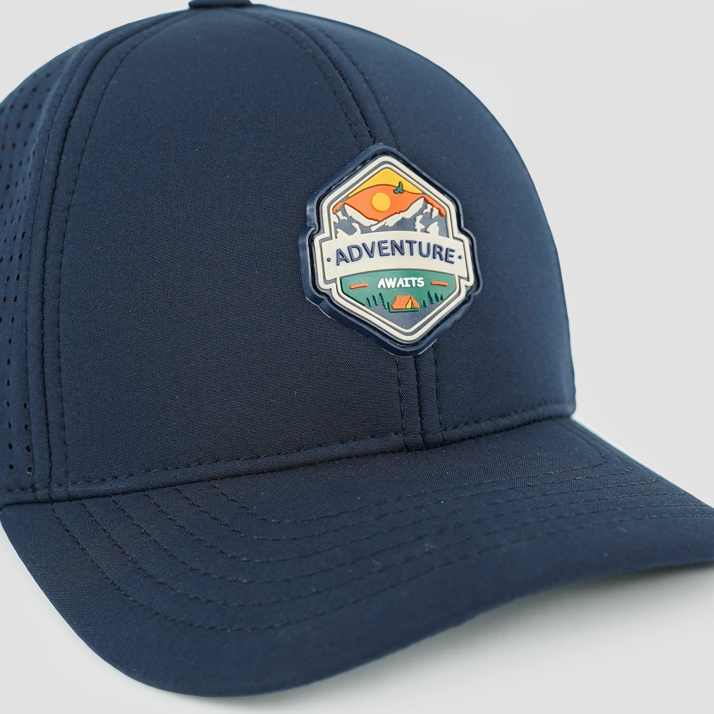 Sweat proof softshell cap in navy, laser-cut holes for breathability