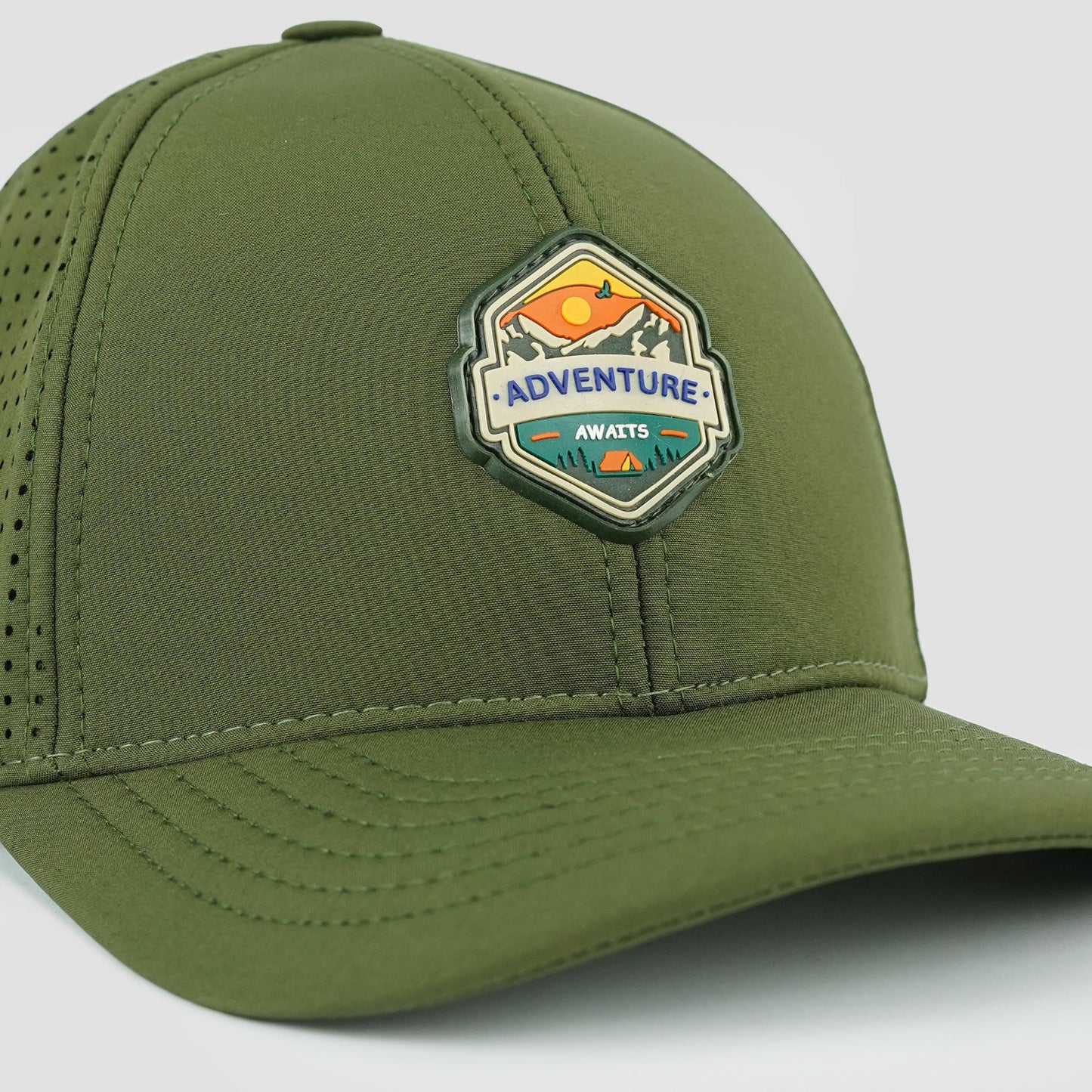 Stretchable olive baseball cap with laser-cut holes, built for adventure