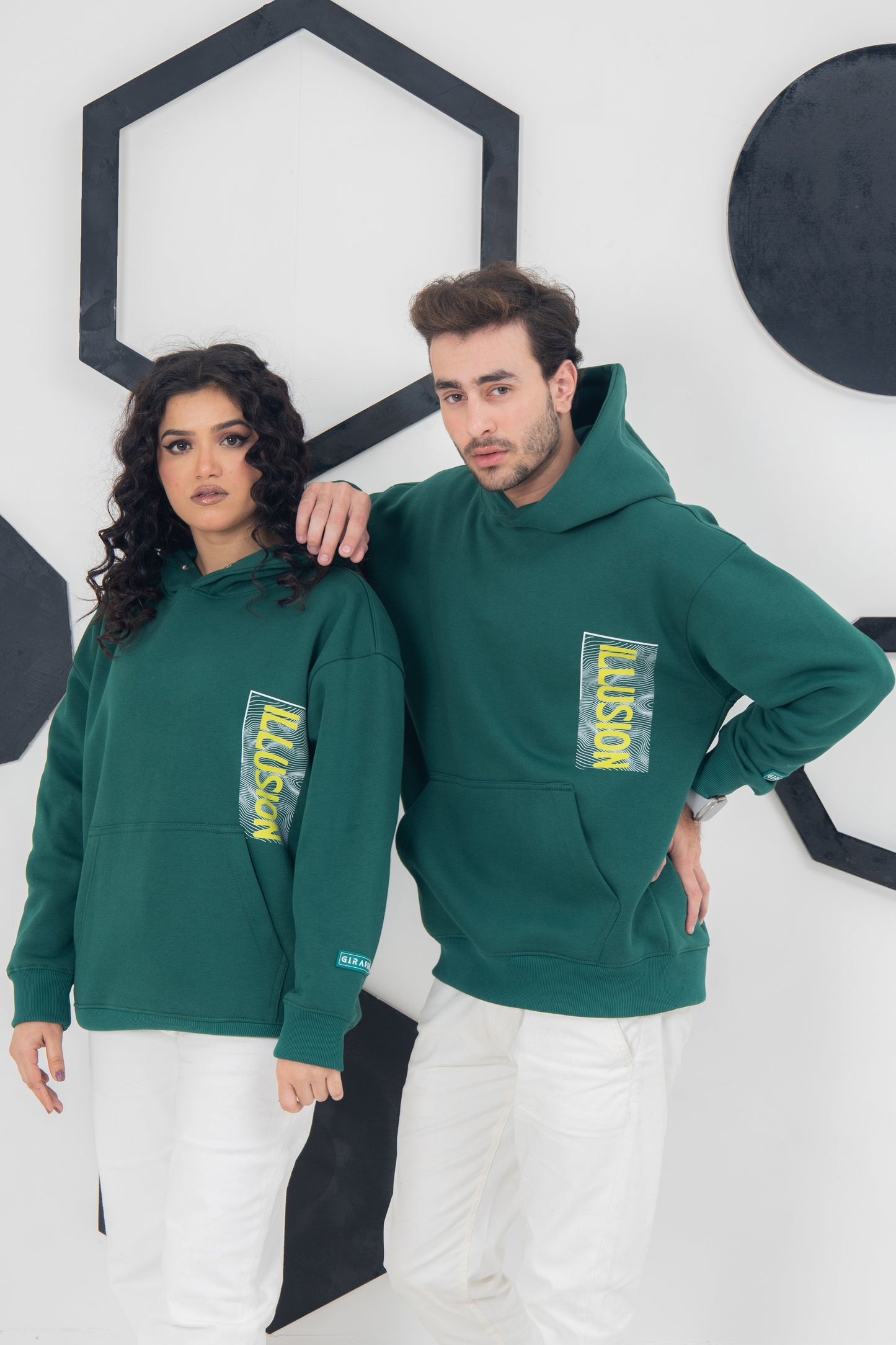 Unisex green hoodie with illusion-style print, front pouch pocket