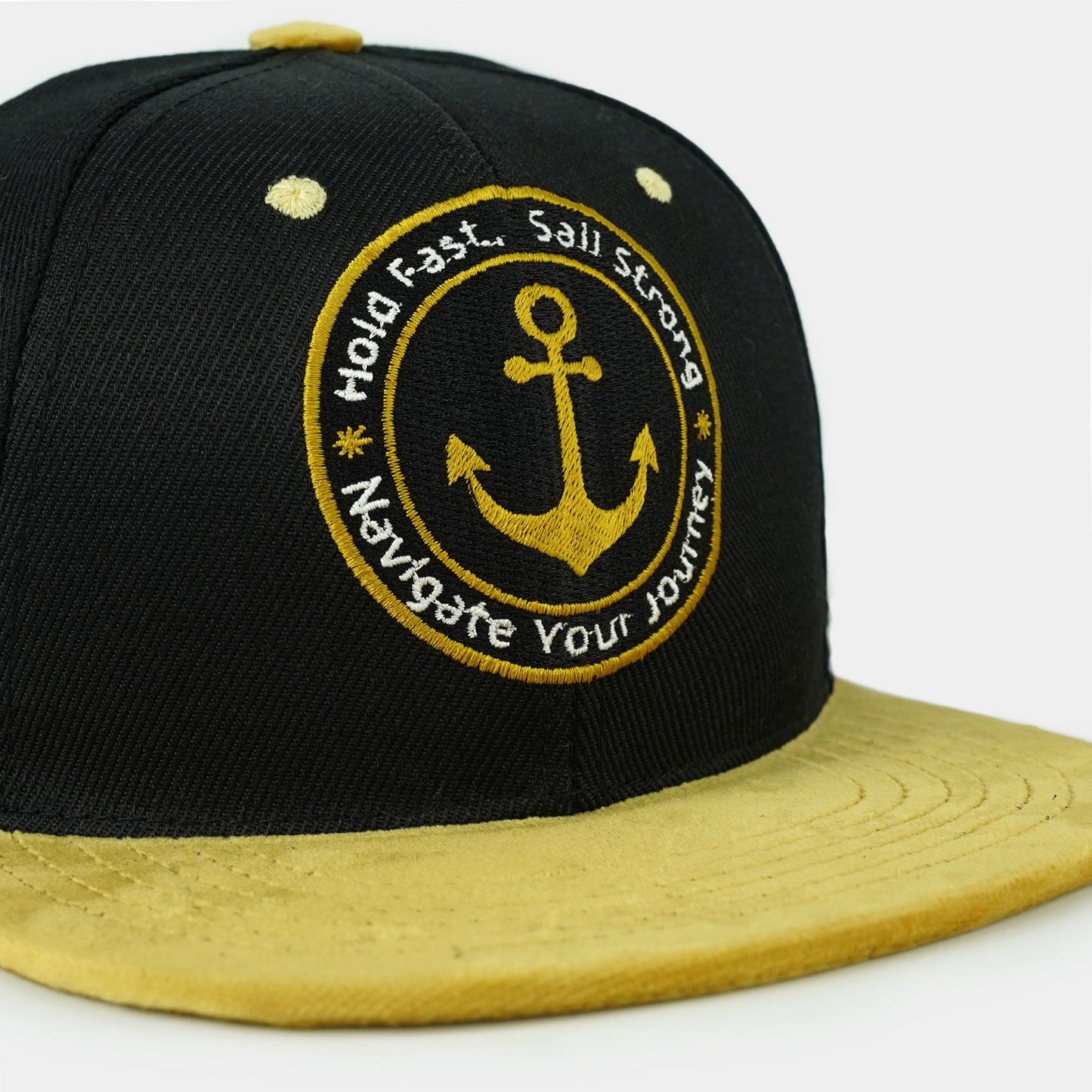 Cotton and suede snapback, "Sail Strong" embroidered, streetwear vibe
