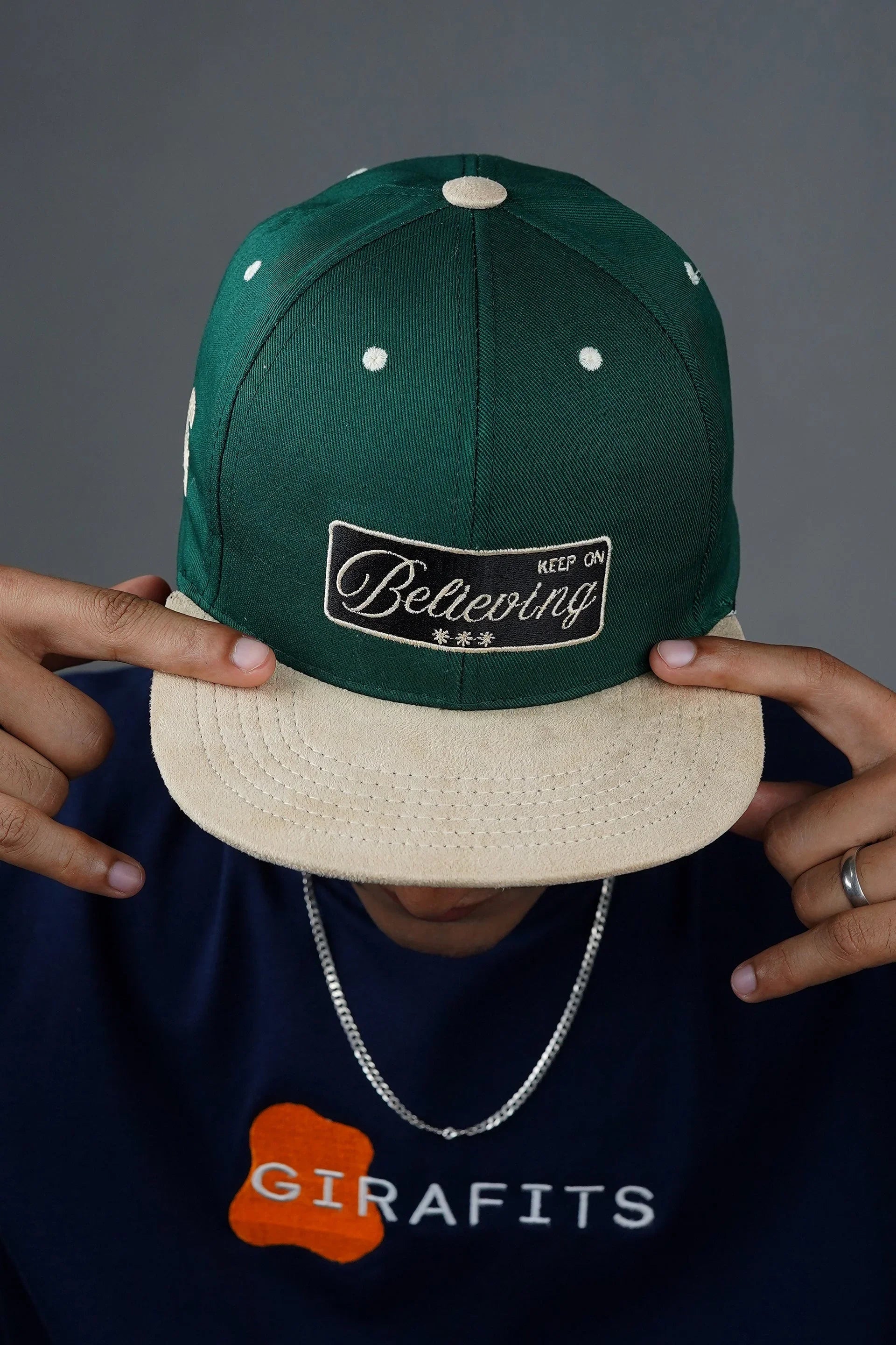Green and beige snapback with 'Keep On Believing' premium embroidery