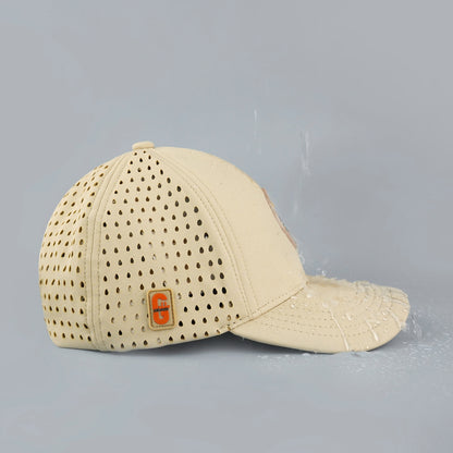 Beige cap with perforated design on a gray background