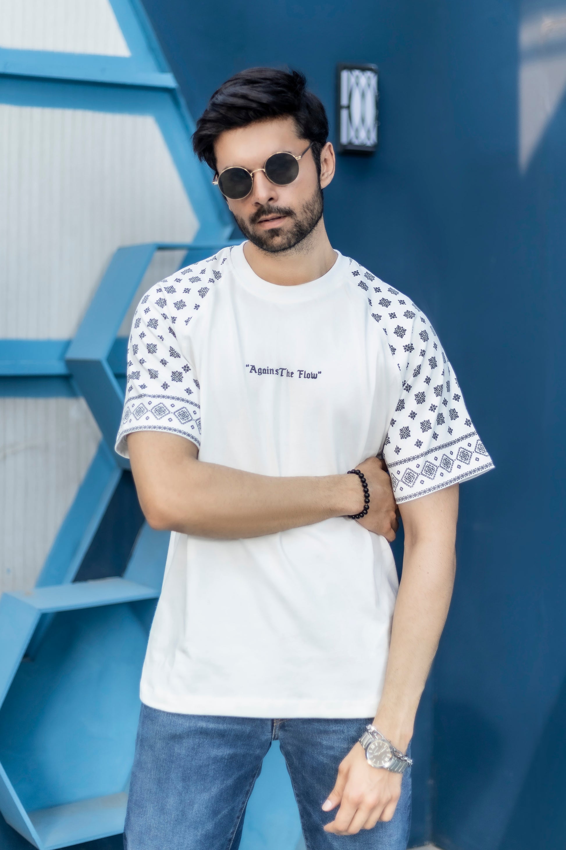 Against The Flow white oversized t-shirt with front and back streetwear design in 220 GSM cotton