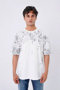 Close-up of white oversized unisex t-shirt with artistic print