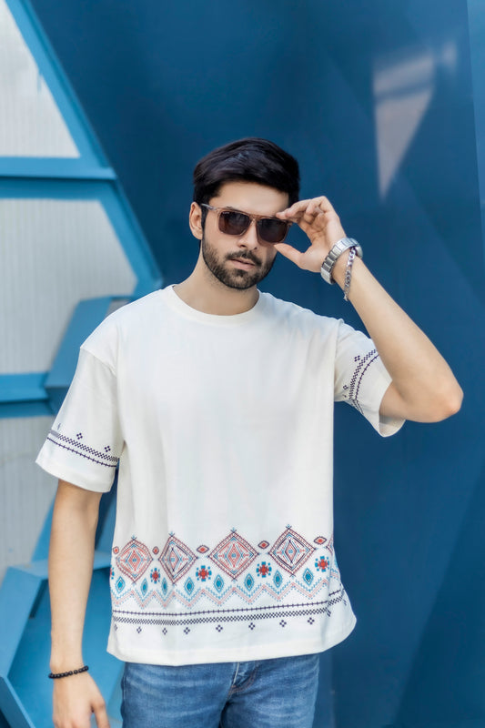 220 GSM white oversized tee with breathable jersey fabric and border artwork