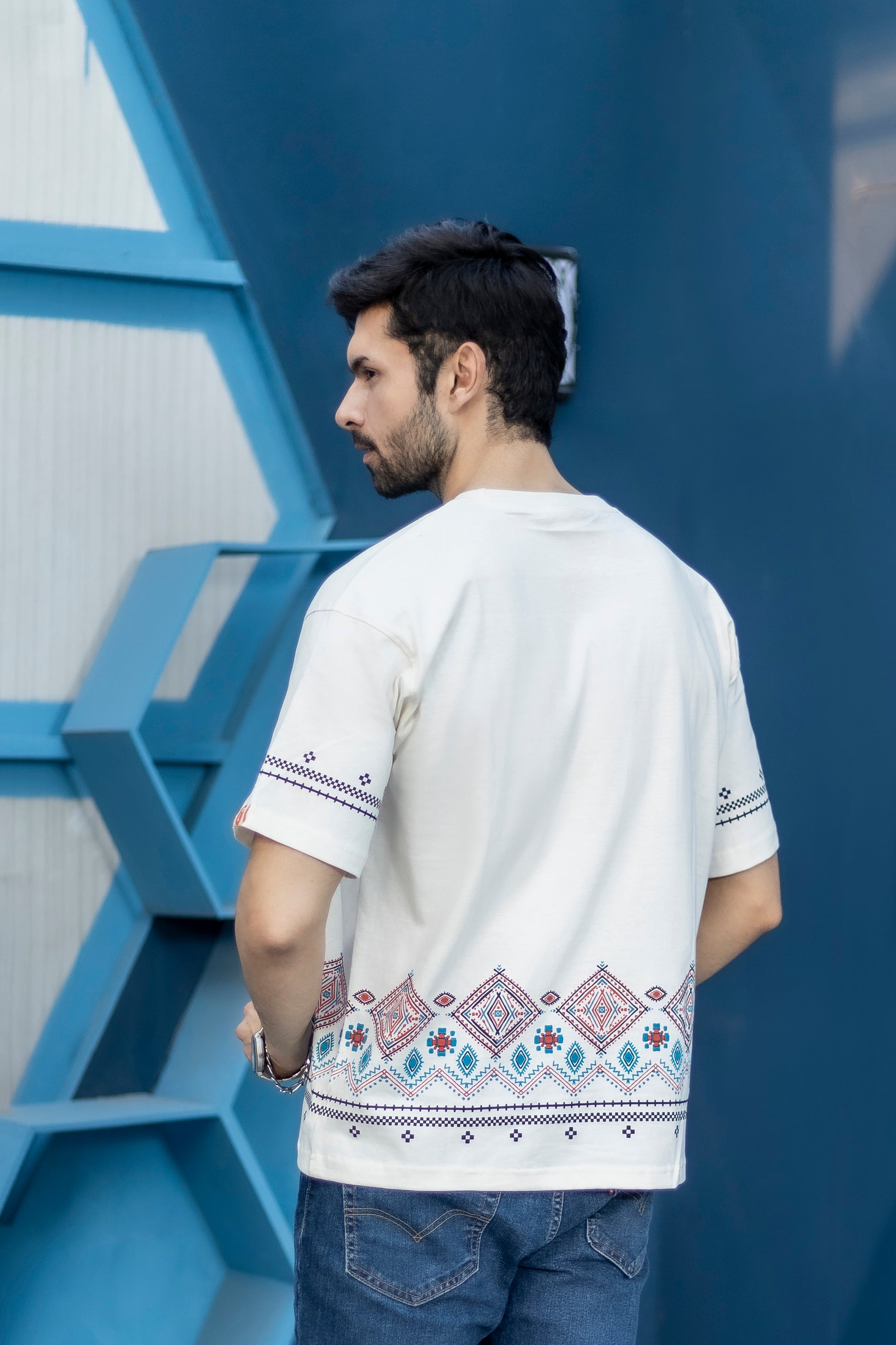 Breathable white half sleeves t-shirt with geometric border design and round neck