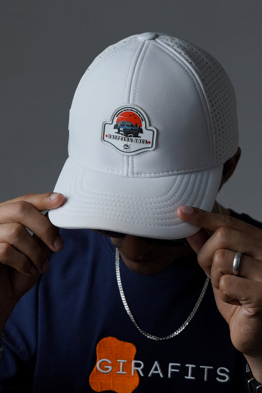 water resistant baseball cap with "Drifting Soul" laser-cut holes