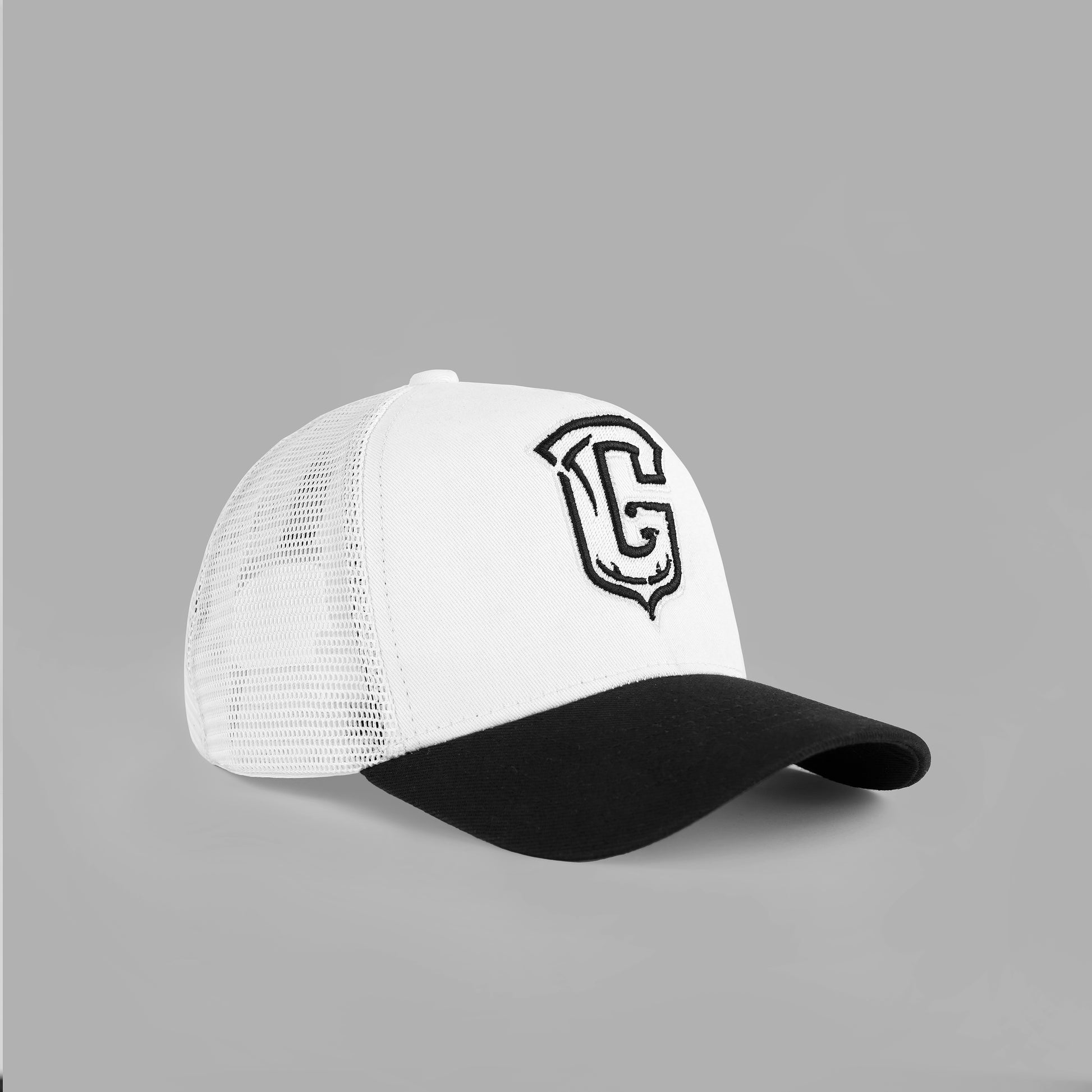 White and black cap with a logo on a light gray background