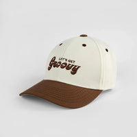 "Let's Get Groovy" embroidered cap in cream and chocolate brown