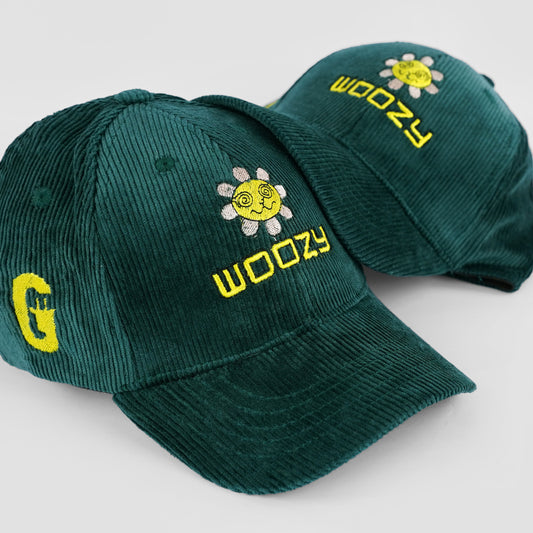 Forest green corduroy cap with premium embroidery, offering a trendy and comfortable everyday look.