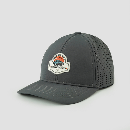 Gray softshell baseball cap with “Drifting Soul” design and laser-cut vents