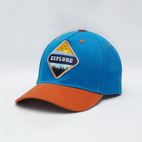 Blue and orange cap with 'EXPLORE' patch on a light gray background
