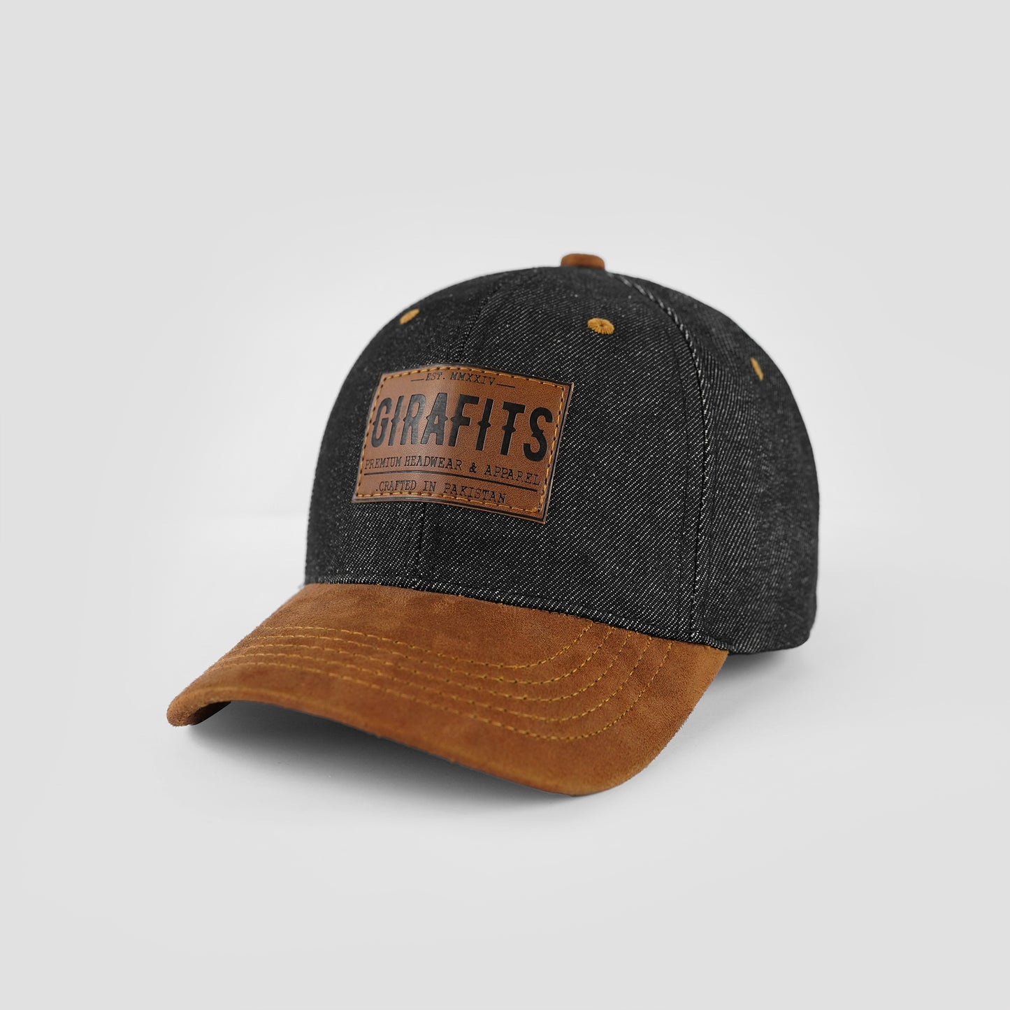 Stylish denim cap featuring suede brim and patch detail.