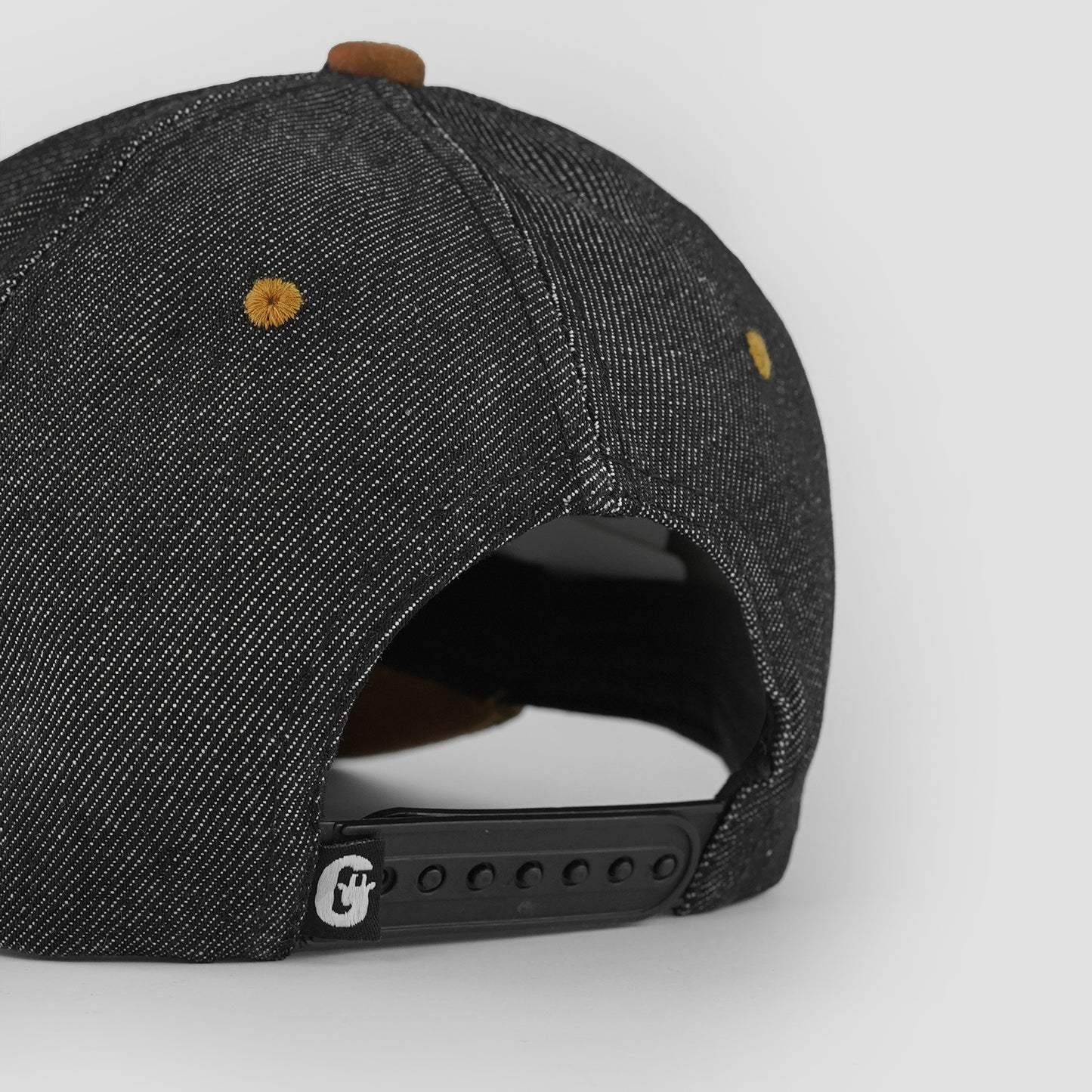 Classic denim cap with leather patch and soft suede visor.