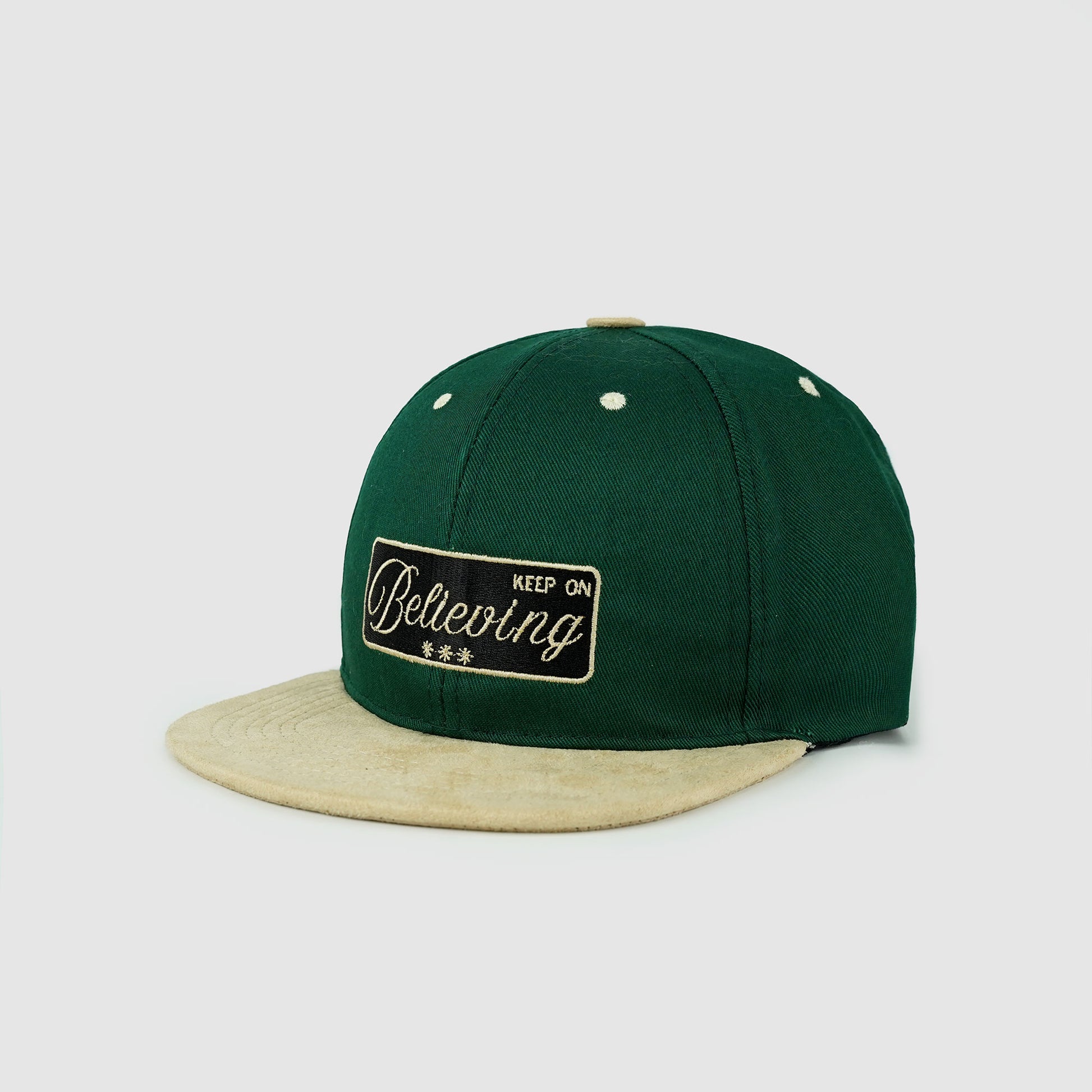 Snapback with embroidered "Keep On Believing", cotton-suede blend
